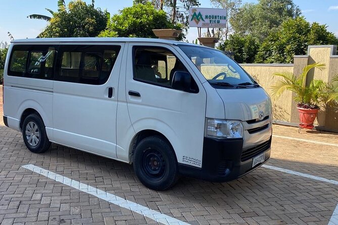 Kigali Day Tour With Lunch and Pickup Service - Biryogo for food, markets, and local color