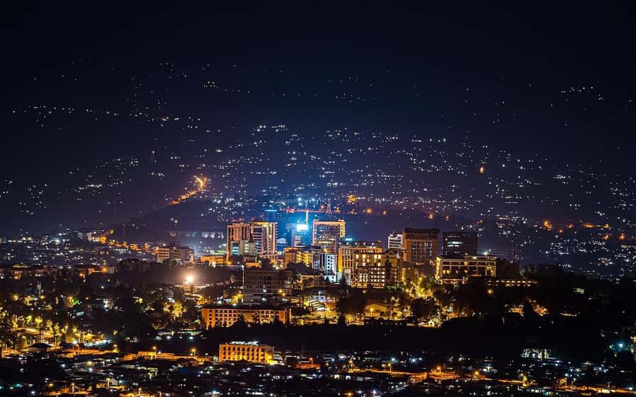 Kigali: Sunset Drinks, Dinner, and Nightlife Tour - Sunset over Kigali, with your first drink